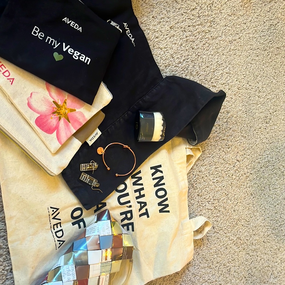 Assortment of Aveda bags in jewelry
